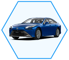 Toyota Mirai II generacji w ramce heksagonalnej.