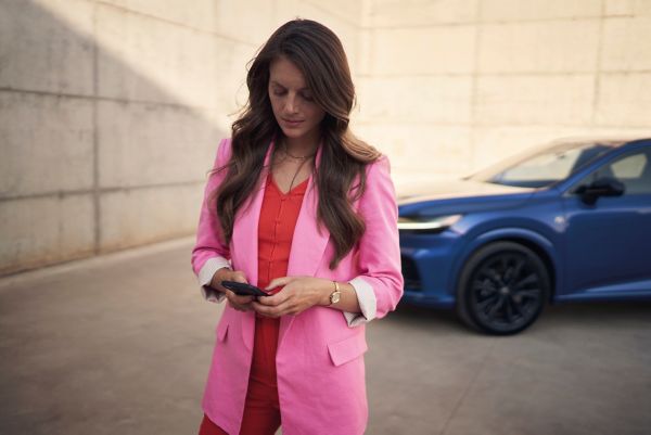 Woman next to Lexus car