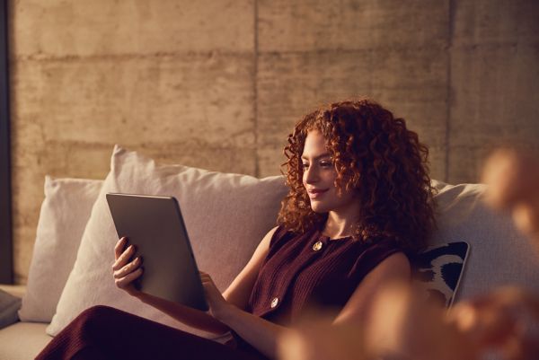 Woman browing laptop