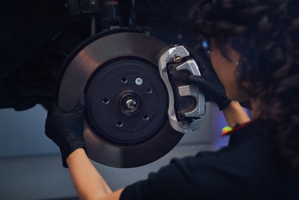 Genuine part being mounted by mechanic