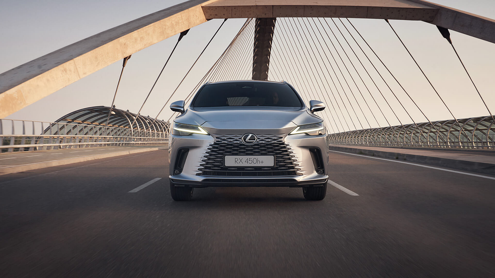 Lexus RX driving on a bridge