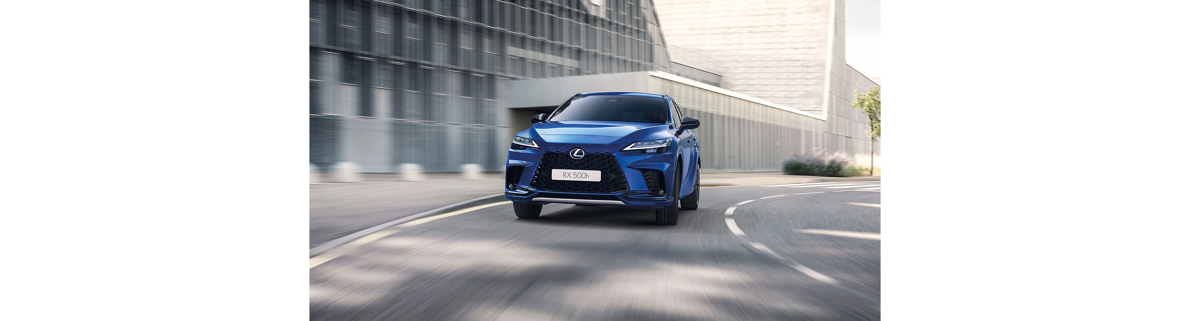 Lexus RX 500h driving round a corner