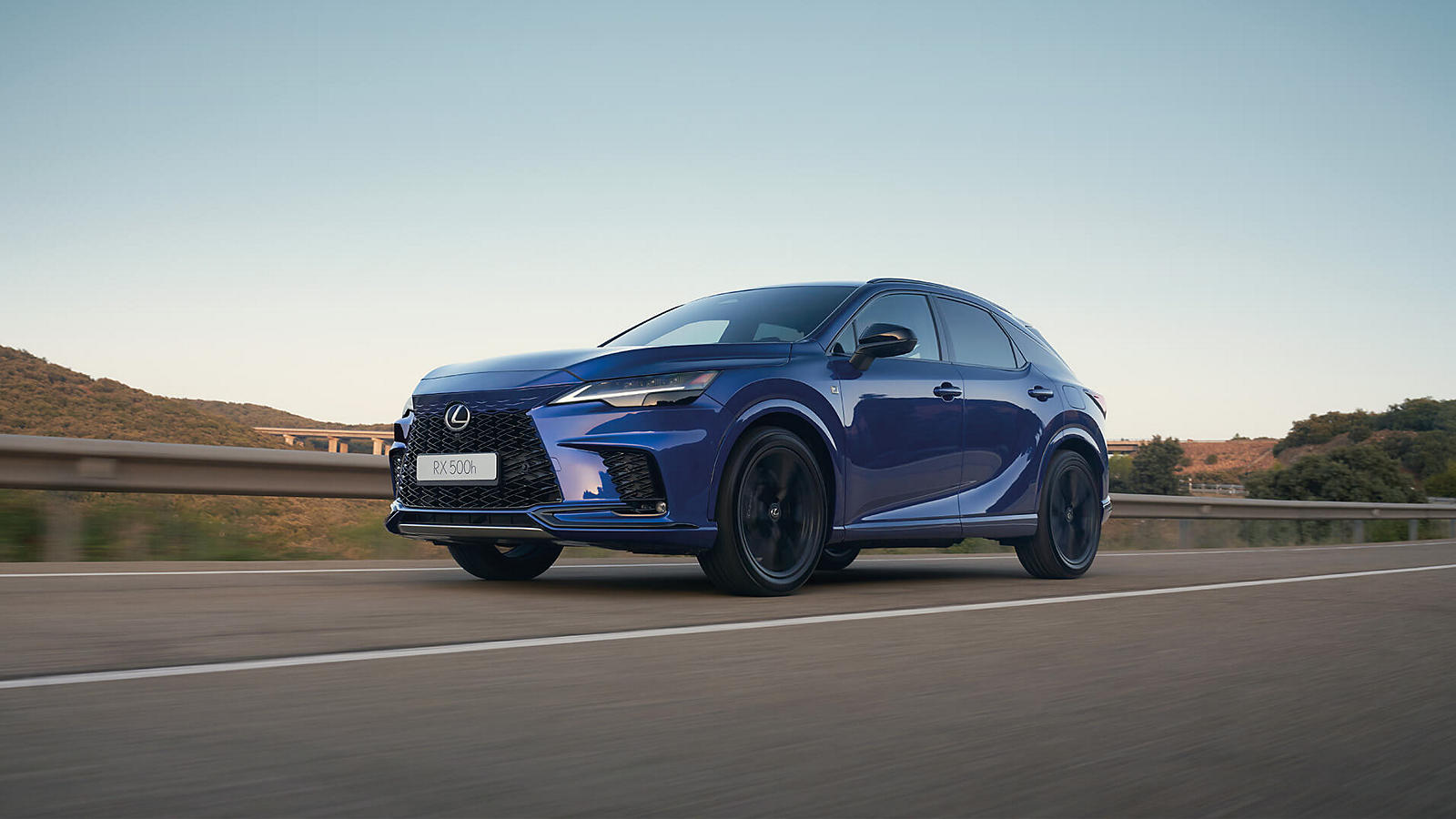A Lexus RX 500h driving