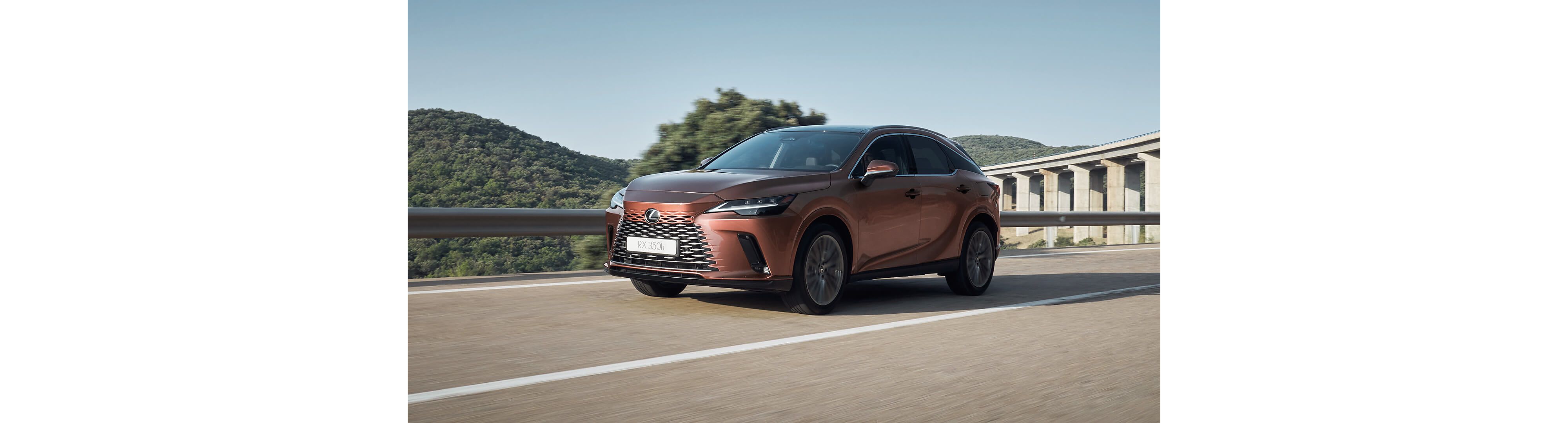 Lexus RX 350h driving in a mountainous location 