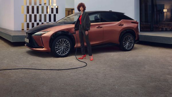 person charging a Lexus UX 300e car