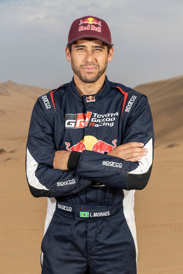 Team 1, Car 200 Driver Nasser Al-Attiyah with hands on hipe smiling to camera