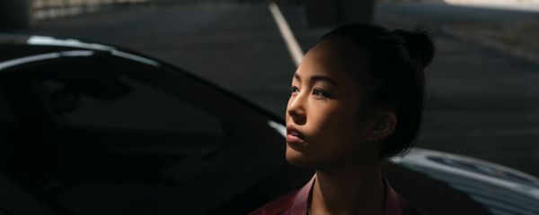 Toyota insurance woman getting out of car