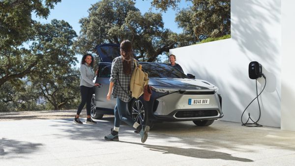 Toyota bZ4X people around the car
