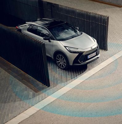Woman driving Toyota C-HR