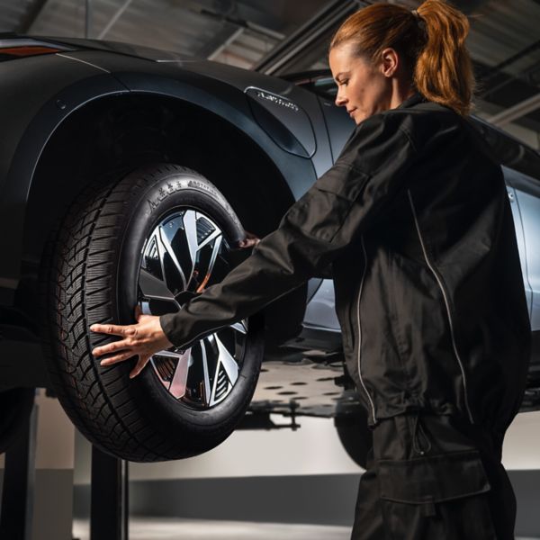 Toyota technician working on a tyre wheel