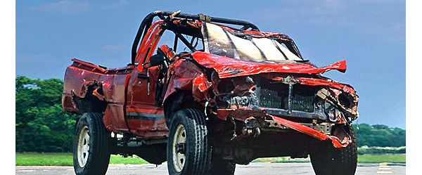 A crushed Toyota Hilux