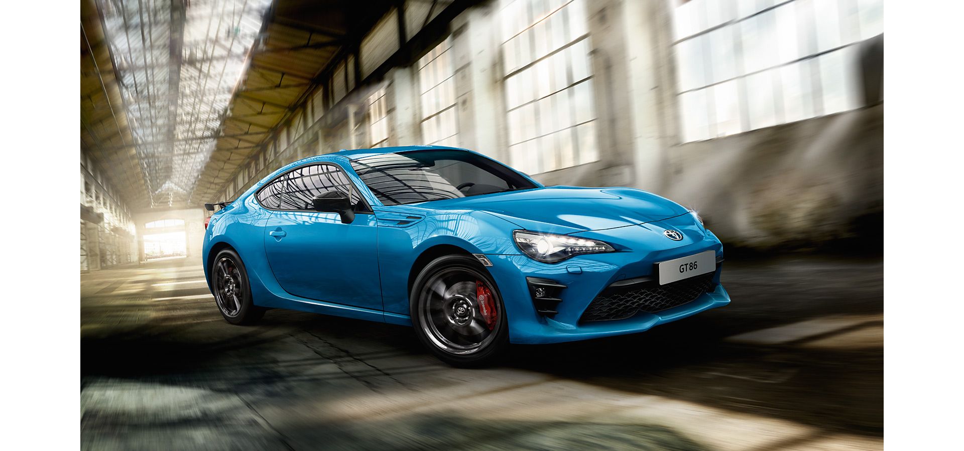 Blue Toyota GT86 driving