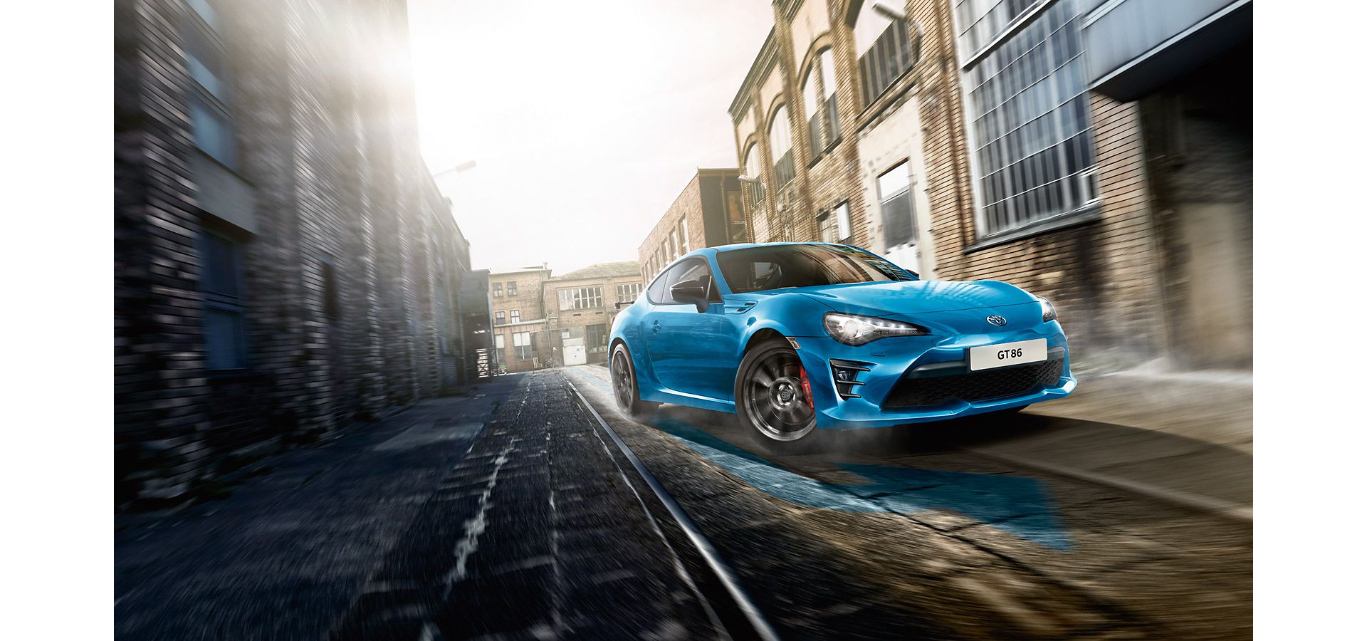 Blue Toyota GT86 driving