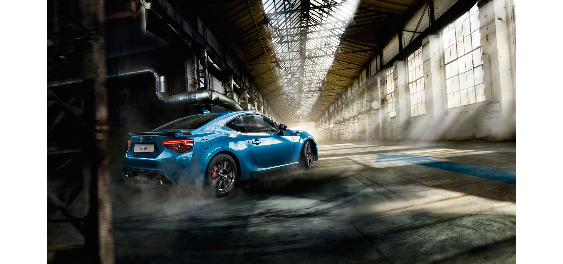 Blue Toyota GT86 driving