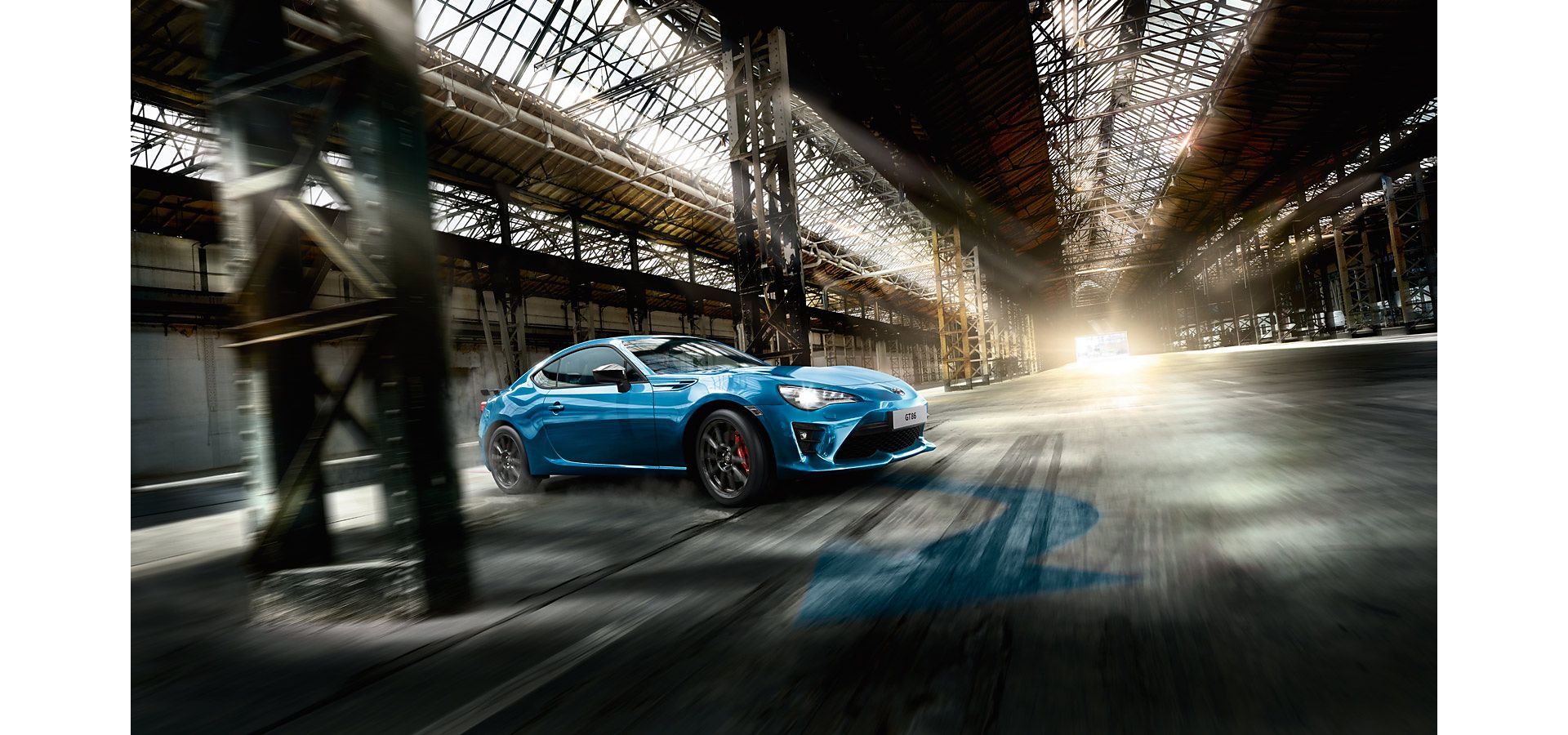 Blue Toyota GT86 driving