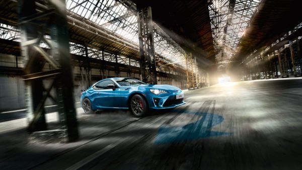 Blue Toyota GT86 driving