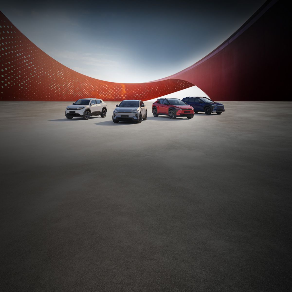 Toyota Urban Cruiser, Toyota C-HR+, Toyota bZ4X und Toyota bZ4X Touring vor modernem Hintergrund.