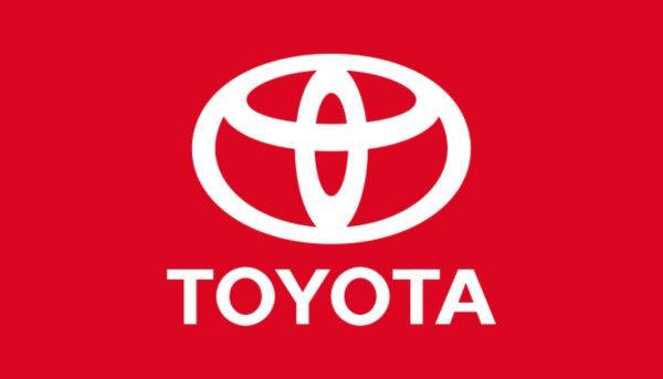 Weißes Toyota Logo auf rotem Hintergrund.