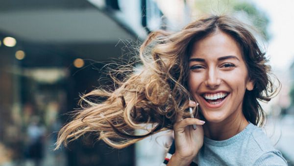 Toyota KINTO Woman on phone smiling