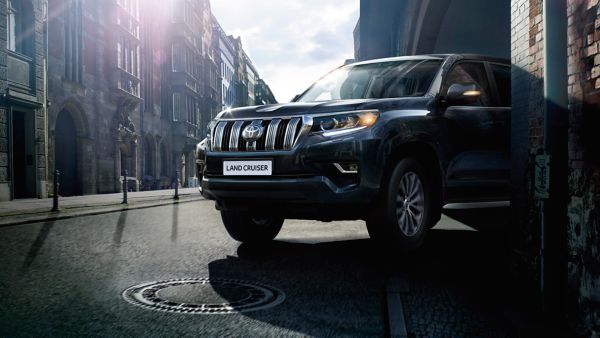 Toyota Land Cruiser parked in the street