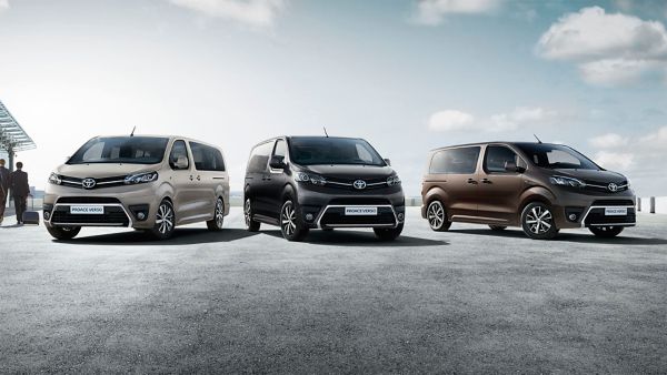 Models shown are  Proace Verso Shuttle Long in Grey Limestone (NEU),  Proace Verso VIP Medium in Misty Black (EXY) and PROACE VERSO Family Compact in Rich Brown (KCM)	