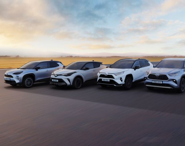 A variety of different Toyota cars parked outside