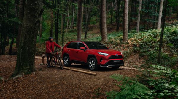 Toyota RAV4 PHEV car driving on road