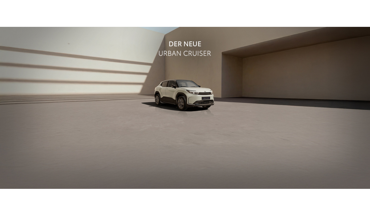 Urban Cruiser steht in einem leeren Innenhof. Text darüber: Der neue Urban Cruiser.