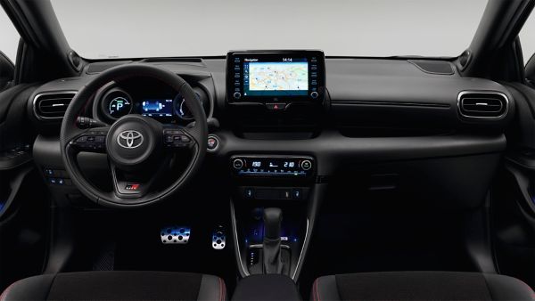 Model shown is Yaris GR SPORT  in bi-tone Dynamic Grey Night Sky Black roof (2RZ) and GR SPORT black fabric with red stitching seat