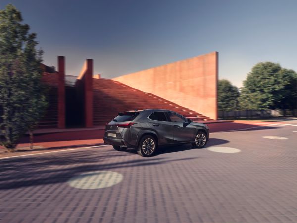 Lexus UX 300e driving outside on a road